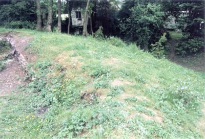 Click to enlarge Betchworth Mobilisation Centre: The profile of the rampart. To the left is the parapet where the flint revetment has been exposed.