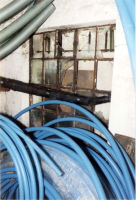 Click to enlarge Betchworth Mobilisation Centre: The lamp room window from the inside. Steel bars on the outside can be see through the top panes.