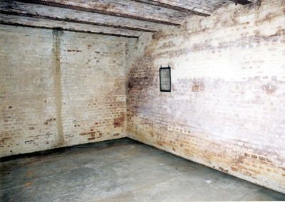 Click to enlarge Betchworth Mobilisation Centre: Inside the shell store, one lamp recess can be seen. There is a second shell store on the other side of the store magazine.