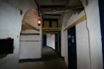 Spitbank Fort: Spithead: Portsmouth: A passage behind the gun casemates, leading to the barrack casemates. Storage for hammocks