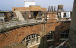 Horse Sand Fort: Spithead, Hampshire: The upper gun deck viewed from the core, with gun casemates beneath.